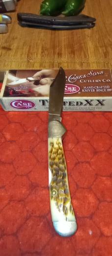 2010 Case XX Mini Copperlock Model 61749L SS Amber Jigged Bone 