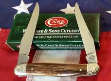 Case xx 2008 Eisenhower Knife Mdl# MUSKRAT SS w/ Wowzeer Oak Wood Handles w/ scrolled bolsters -NOS