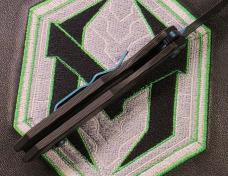 Heretic Jinn Button Lock Flipper Metallic Teal MagnaCut Carbon Fiber Handles