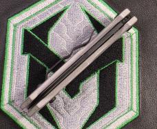 Heretic Jinn Button Lock  Flipper  Battle Black MagnaCut  Blizzard Worn Chassis