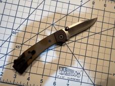 Buck 112 Ranger Sport Folding Knife 3" S35 plain Blade, Black Aluminum Handles with Green Micarta I