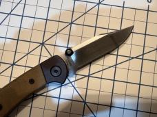 Buck 112 Ranger Sport Folding Knife 3" S35 plain Blade, Black Aluminum Handles with Green Micarta I