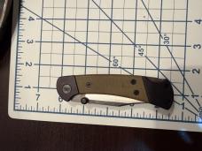 Buck 112 Ranger Sport Folding Knife 3" S35 plain Blade, Black Aluminum Handles with Green Micarta I