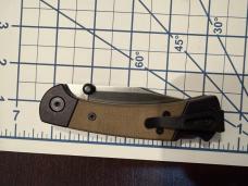 Buck 112 Ranger Sport Folding Knife 3" S35 plain Blade, Black Aluminum Handles with Green Micarta I