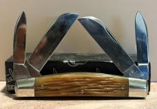 QUEEN 2002-2017 TAN BONE 4 BLADE CONGRESS LIKE NEW