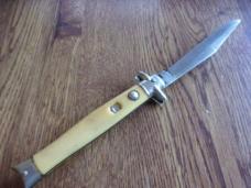yellow shur snap fishtail auto knife
