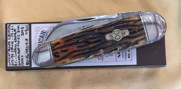 This is a Schatt & Morgan Wildcat Driller Whittler pocket knife from the 2006 "File & Wire" series. This is a Schatt & Morgan Wildcat Driller Whittler pocket knife from the 2006 "File & Wire" series.