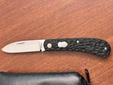 Enrique Peña Mini Zulu in Jigged Black Paper Micarta over Green G10 liners