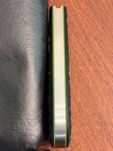 Enrique Peña Mini Zulu in Jigged Black Paper Micarta over Green G10 liners