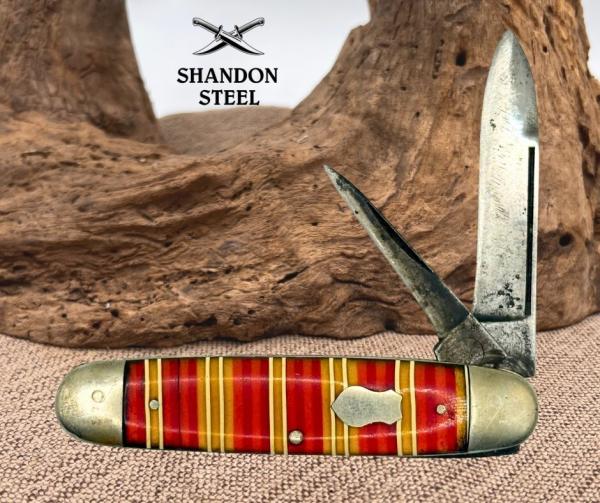Remington UMC R555 Double Blade Folding Jack Knife USA Candy Stripe Handle (17) Remington UMC R555 Double Blade Folding Jack Knife USA Candy Stripe Handle (17)