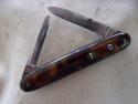 3-3/8 Schrade double tortoise celluloid scales 
