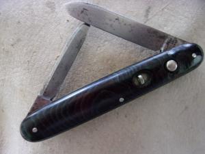 3-38 Schrade double green mottled scales
