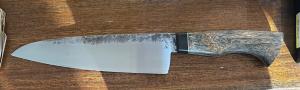 Ben Akin Chef knife most likely a 11 as he is a custom knife maker