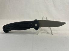 Vintage BENCHMADE Black Partially Serrated Automatic