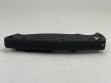Vintage BENCHMADE Black Partially Serrated Automatic