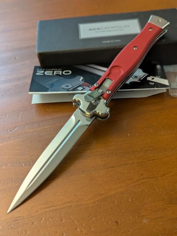 NIB AGA CAMPOLIN ZERO RED COLORED ALUMINUM, POLISHED DAGGER BLADE & BOLSTERS