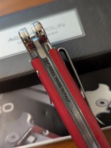 NIB AGA CAMPOLIN ZERO RED COLORED ALUMINUM, POLISHED DAGGER BLADE & BOLSTERS