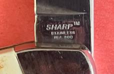 Two Sharp USA pocket knives