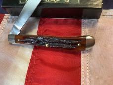 Queen Cutlery Slimline Trapper (#11) w/ Great Amber Stag Bone Handles -NOS in orig box