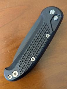 HUBERTUS TACTICAL Z2001 BLACK ON BLACK SERRATED DROP POINT BLADE ZYTEL POLYMER SCALES COIL SPRING