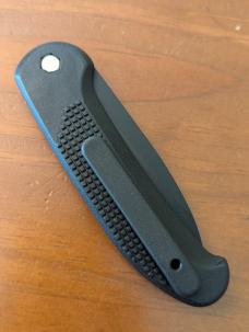 HUBERTUS TACTICAL Z2001 BLACK ON BLACK SERRATED DROP POINT BLADE ZYTEL POLYMER SCALES COIL SPRING