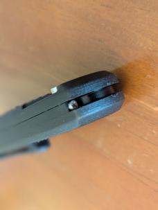 HUBERTUS TACTICAL Z2001 BLACK ON BLACK SERRATED DROP POINT BLADE ZYTEL POLYMER SCALES COIL SPRING