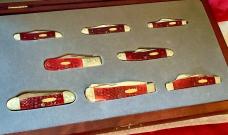 Case xx, One of 500, Dark Red Bone Set w/ Dark Red Bone Handles +Gold Shield & Scrolled Bolsters