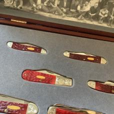 Case xx, One of 500, Dark Red Bone Set w/ Dark Red Bone Handles +Gold Shield & Scrolled Bolsters