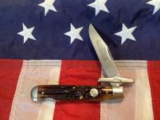 Queen Made Cheetah / Swing Guard w/ Amber Carved Stag Bone Handles (Mdl# 1L ACSB) -NOS in orig box
