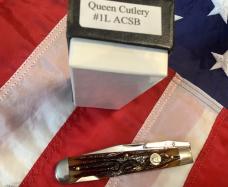 Queen Made Cheetah / Swing Guard w/ Amber Carved Stag Bone Handles (Mdl# 1L ACSB) -NOS in orig box