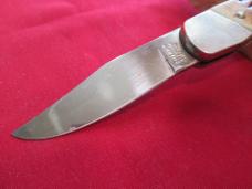 SHARP USA 700 Small Jigged Bone Lockback Stainless Knife (hairline crack)