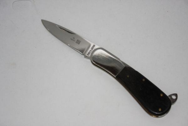 Al Mar Model 2 knife w swing out lanyard ring. 