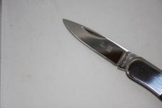 Al Mar Model 2 knife w swing out lanyard ring. 