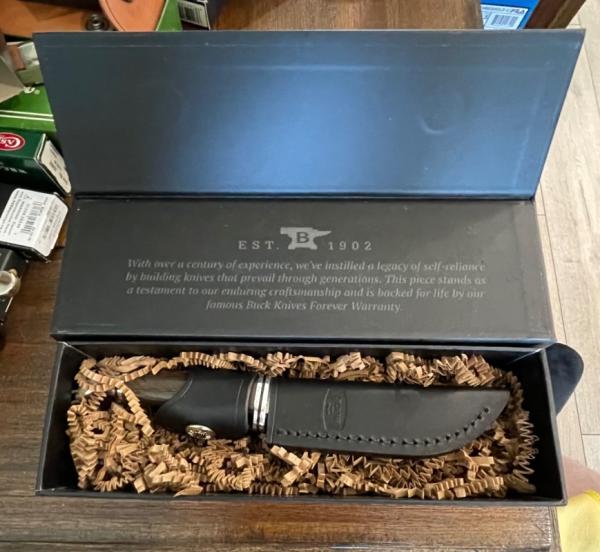 BUCK 102GRS1-B Woodsman Pro with Micarta handle. Discontinued 