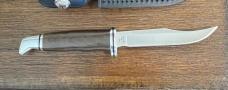 BUCK 102GRS1-B Woodsman Pro with Micarta handle. Discontinued 