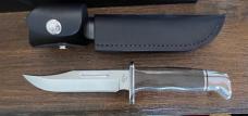 BUCK 119GRS1-B 119GCM PRO with green Micarta handles. Discontinued 