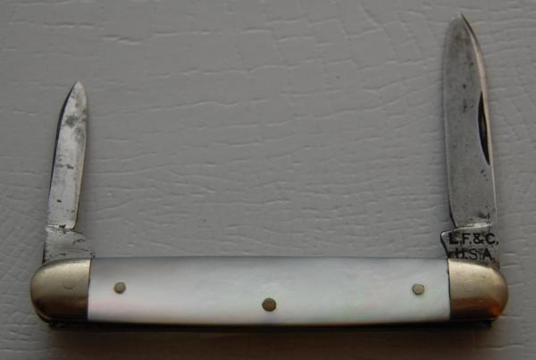 Landers, Frary and Clark In Excellent Condition With Mother of Pearl Covers 2 3/4