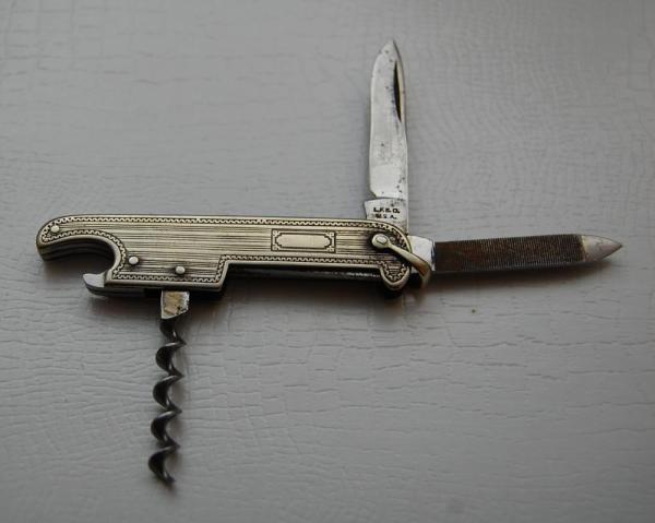 Landers, Frary and Clark Bartenders Knife In Excellent Condition With Metal Covers 2 7/8" Long (372)