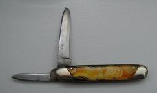 Landers, Frary and Clark In Good Condition With Celluloid Covers 3 3/8