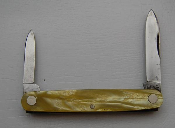 Landers, Frary and Clark In Very Good Condition With Celluloid Covers 3 1/4 Landers, Frary and Clark In Very Good Condition With Celluloid Covers 3 1/4