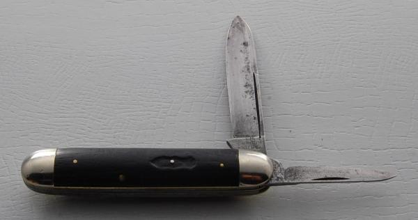 Empire In Very Good Condition With Wood Covers 3 3/8" Long (681)