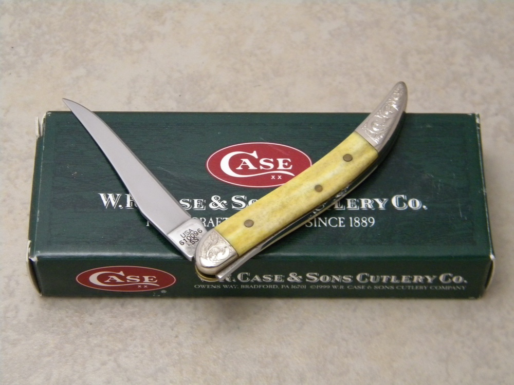 Case XX USA 2007 Smooth Antique Bone 610096 SS Scrolled Bolsters Tiny