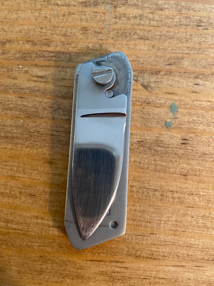 Gerber touché belt buckle knife wood grain and scrimshaw fish