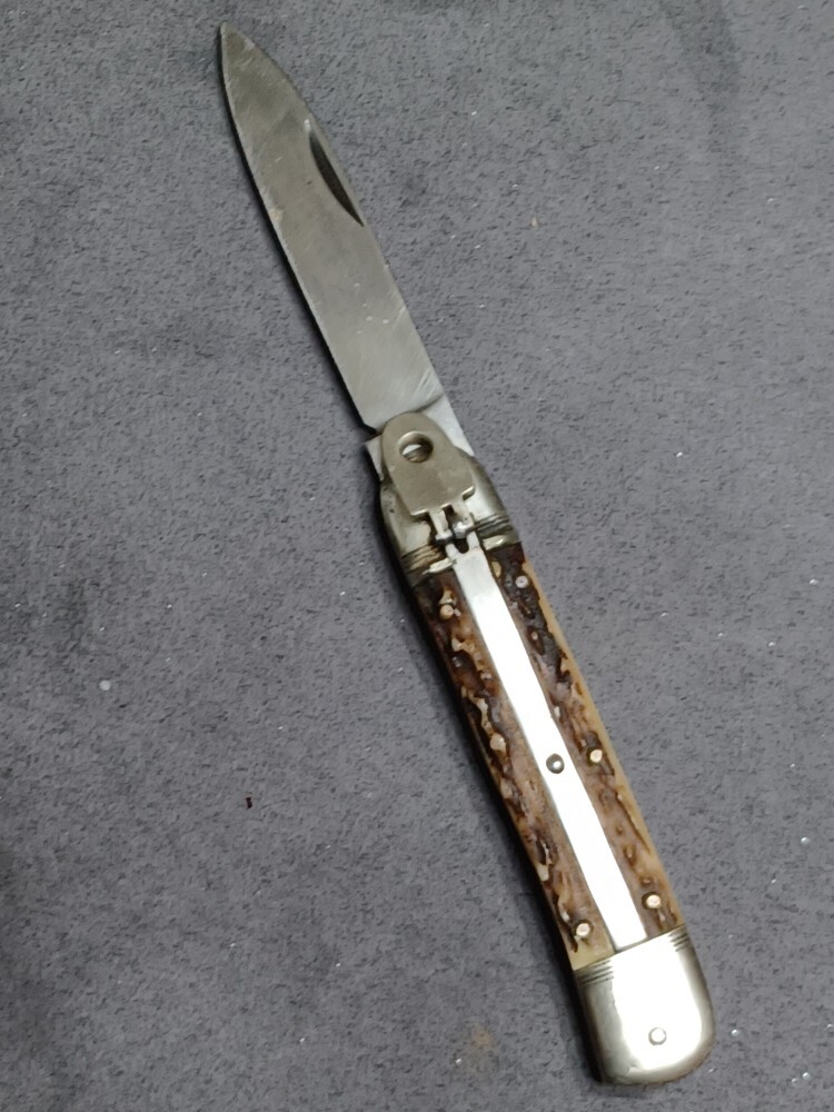 8" Vintage Hubertus Lever lock knife.
