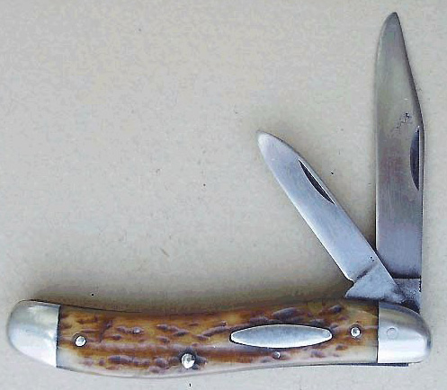 https://www.allaboutpocketknives.com/images/content/cattaraugus-pattern-22029-serpentine-jack-knife.jpg