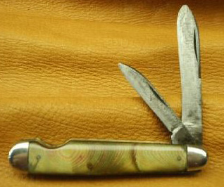 https://www.allaboutpocketknives.com/images/content/cattaraugus-pattern-24884-easy-open-jack-knife.jpg