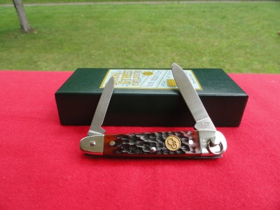 Dark Amber Aberdeen Jig Bone Sleeveboard Ring Opener.JPG