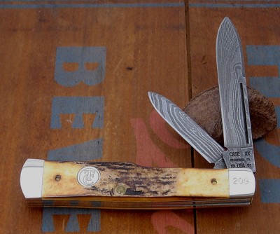 Case TC damascus gunstock.jpg