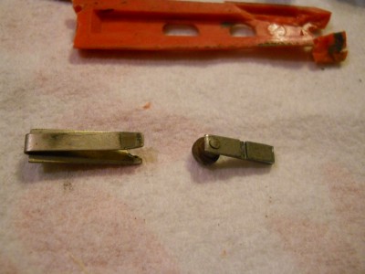 5 under side of lock and button-sheer. Pocket mill in scale acts as a retainer for the whole assembly..JPG
