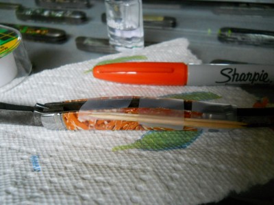 orange Sharpie, clear nail polish and a splint.JPG